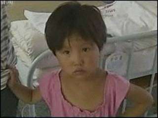 Criança em hospital na China
