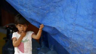 Niña siria en un campo de refugiados