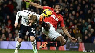 Christian Eriksen y Antonio Valencia