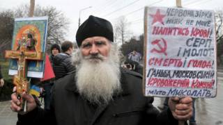 священник