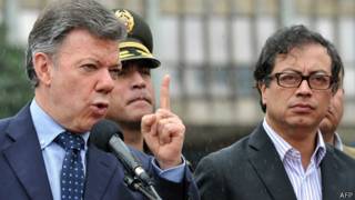 Juan Manuel Santos (izq.) y Gustavo Petro (foto de 2013)