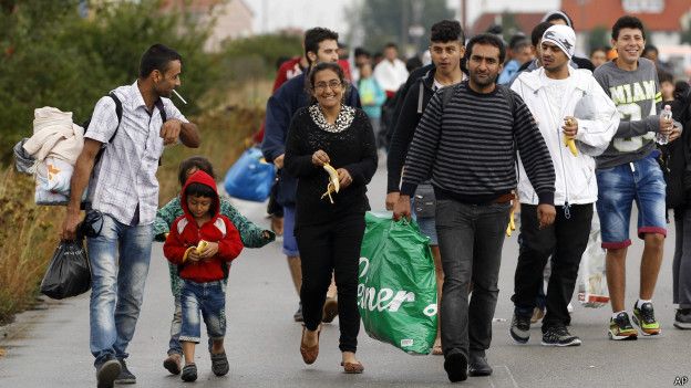 Migrants walk