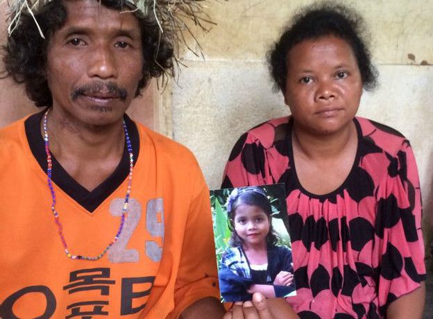 Padres de una niña malaya